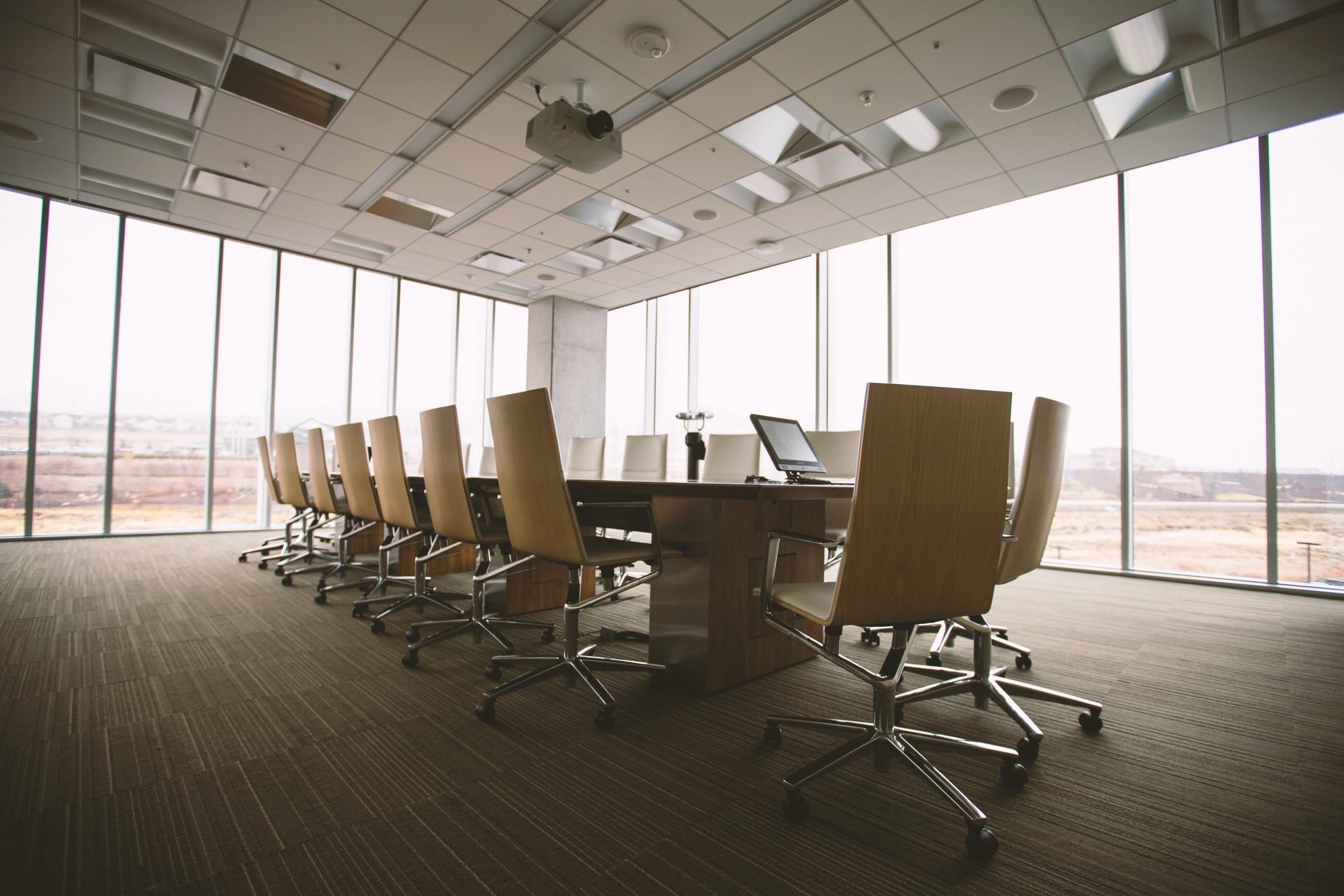 Image of an empty boardroom with panoramic views